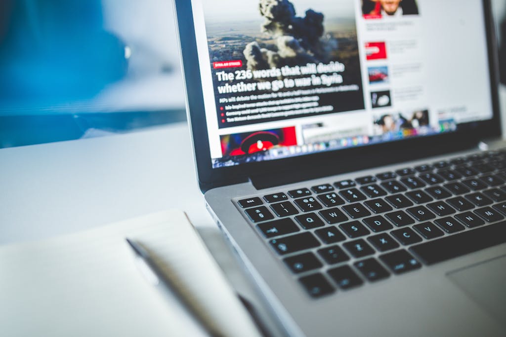Laptop displaying a website page